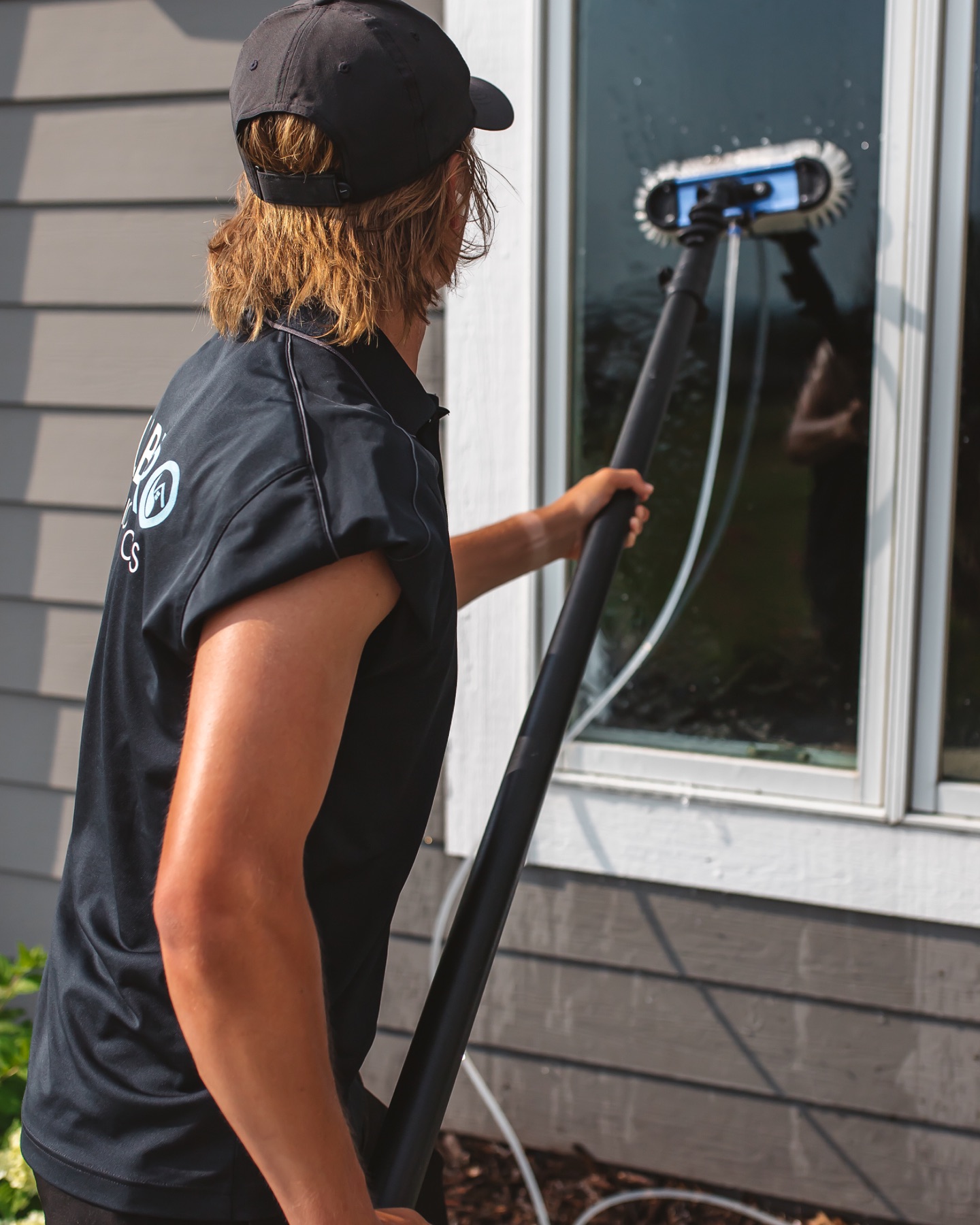 Sub Zero Cleaning Exterior Windows of a house